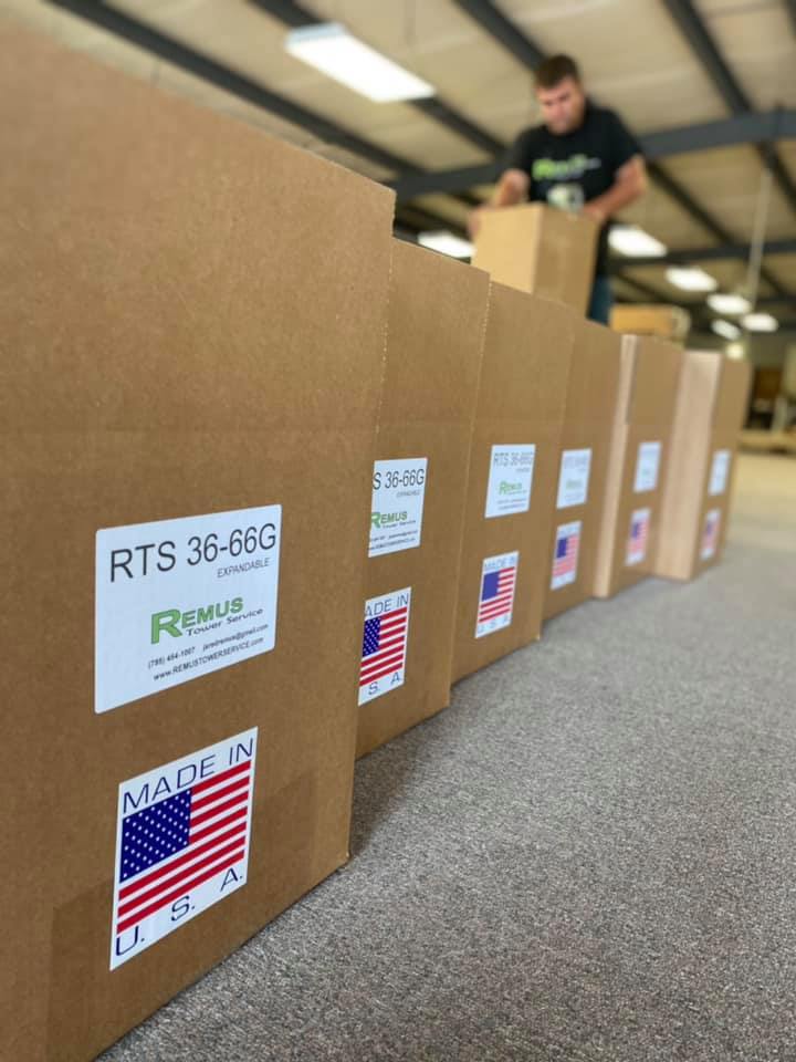 Jared packages RTS-36-66G Remus Tower Beacon Extensions into boxes for shipping. 